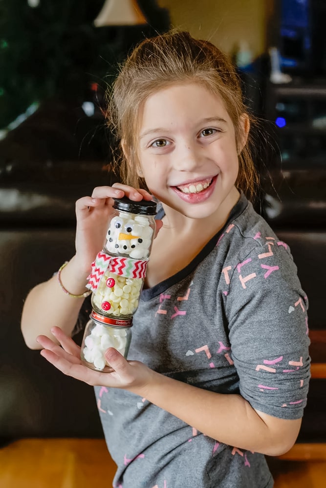 A homemade gift idea that doubles as a fun craft for kids, this DIY Hot Cocoa Snowman is adorable and easy to make too!