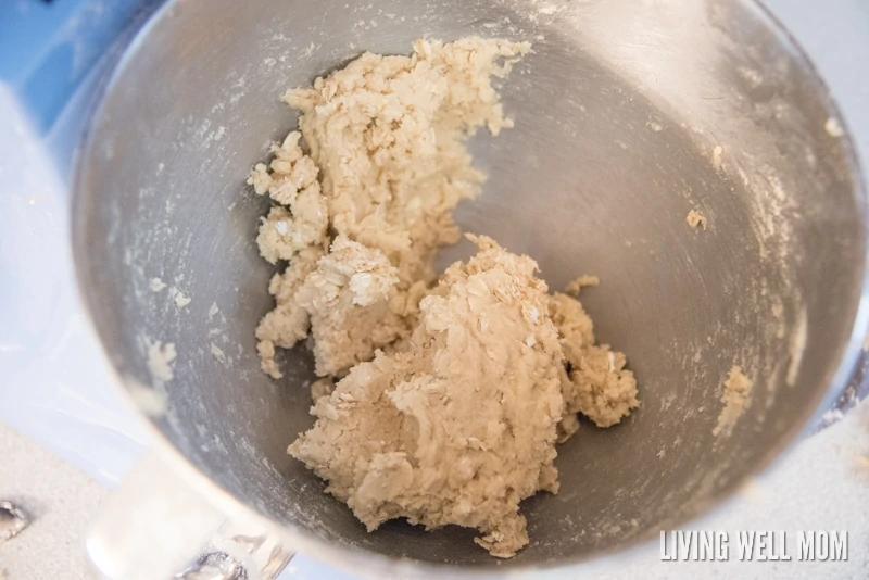 Butter, brown sugar, oats, rice cereal, flour and baking soda combined in a mixing bowl.