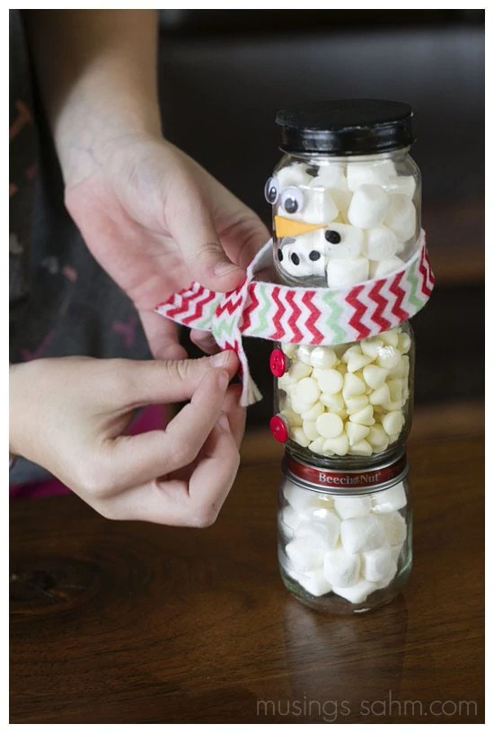 Snowman made of hot chocolate jars