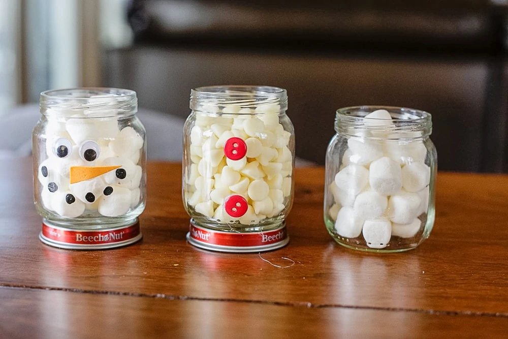 A homemade gift idea that doubles as a fun craft for kids, this DIY Hot Cocoa Snowman is adorable and easy to make too!