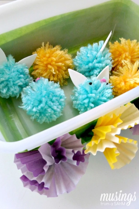 DIY Pom Pom Chicks and Bunnies with an upcycled wipes bin as storage & a fun Tic Tac Toe game board!