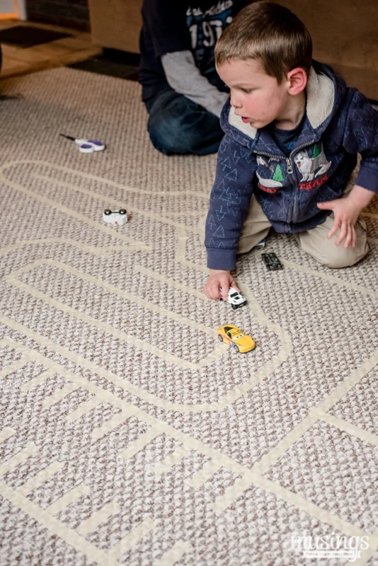 Use colored masking tape to create a road on the floor. Make a carwash from  a cardboard box. Endless play! Great fo…