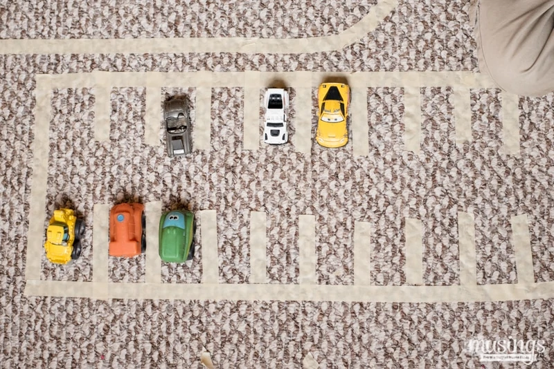 Use colored masking tape to create a road on the floor. Make a carwash from  a cardboard box. Endless play! Great fo…