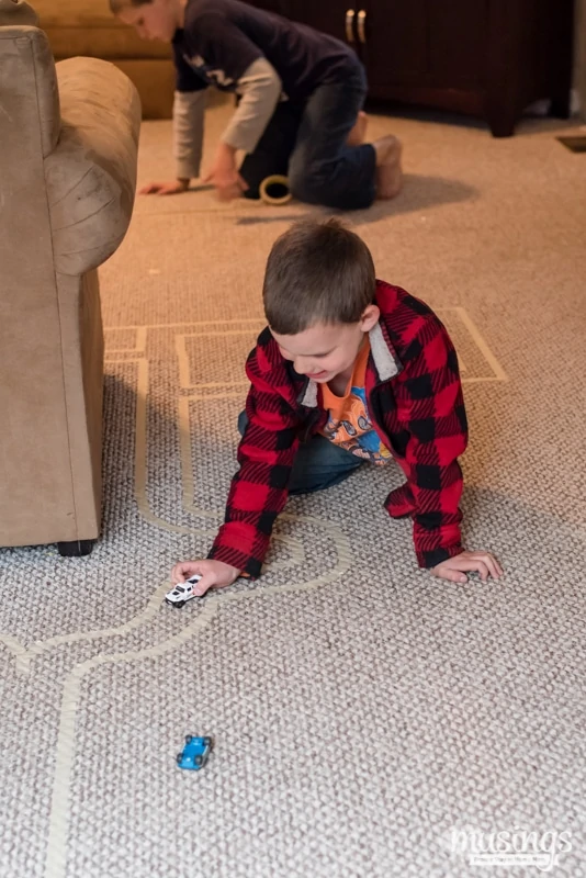 Use colored masking tape to create a road on the floor. Make a carwash from  a cardboard box. Endless play! Great fo…