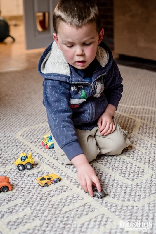 Use colored masking tape to create a road on the floor. Make a carwash from  a cardboard box. Endless play! Great fo…