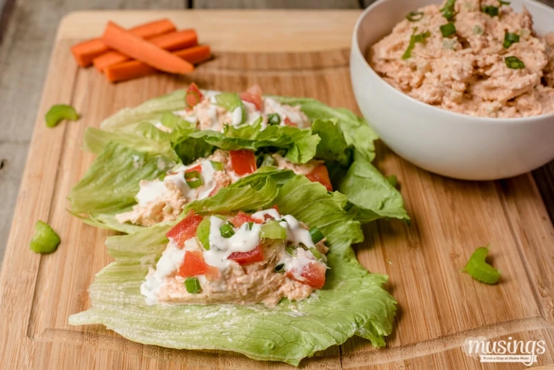 Buffalo Chicken Quinoa Lettuce Wraps are a perfect lunch or quick and easy dinner; you'll love how spicy and tangy this deliciously low carb recipe is!