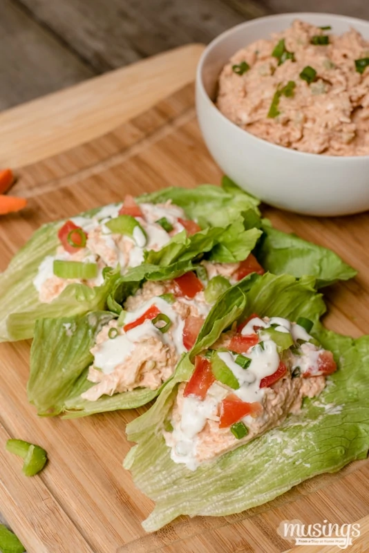 Buffalo Chicken Quinoa Lettuce Wraps are a perfect lunch or quick and easy dinner; you'll love how spicy and tangy this deliciously low carb recipe is!