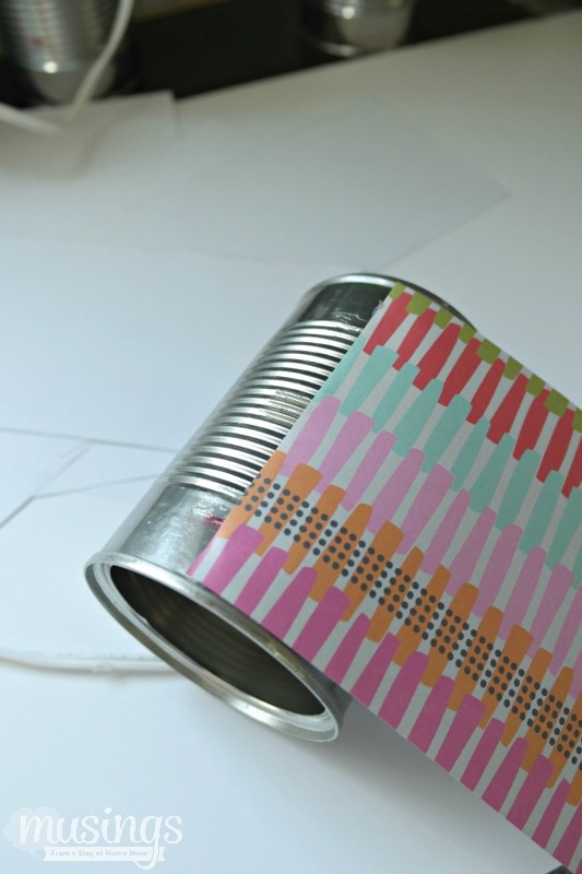 This Decorated Tin Can Organizer for Kids is perfect for storing scissors, pens, markers, glue sticks and so much more. Easy and inexpensive, this DIY project is cute enough to display on a desk or craft table. Adults will love it too!