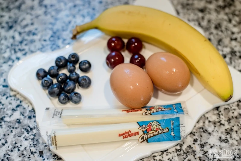 This quick-and-easy Scrambled Eggs & Cheese Monster is a fun breakfast with a cheesy twist. You'll love that this recipe for kids is packed with protein and they'll love creating their own "monster" with delicious fresh fruit!