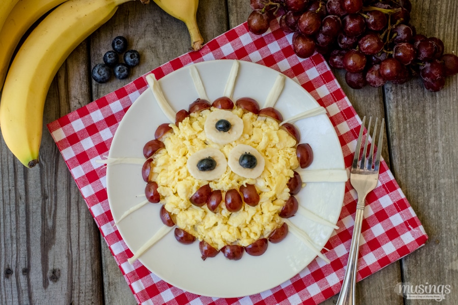 This quick-and-easy Scrambled Eggs & Cheese Monster is a fun breakfast with a cheesy twist. You'll love that this recipe for kids is packed with protein and they'll love creating their own "monster" with delicious fresh fruit!