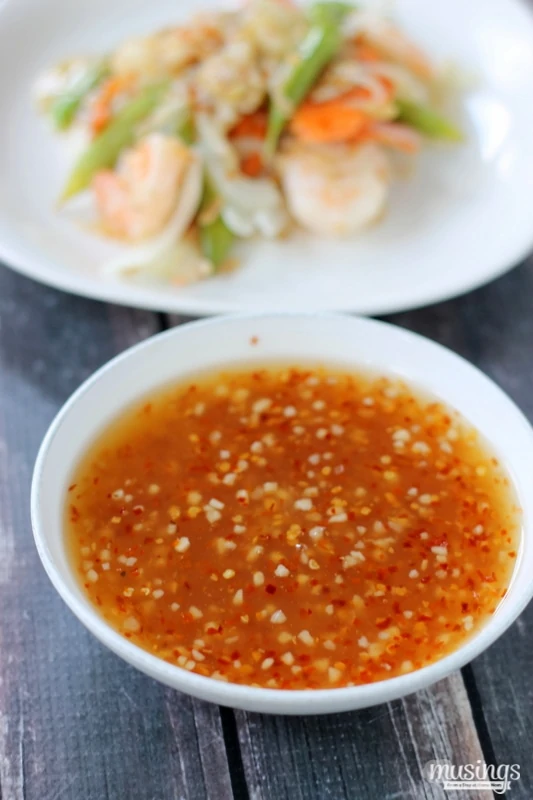 Treat yourself to this tasty Sweet Chili Asian Shrimp Stir Fry recipe for a quick and easy, healthy dinner. You'll love the flavorful honey sauce (there's no sugar!) combined with vegetables and shrimp. Yum!