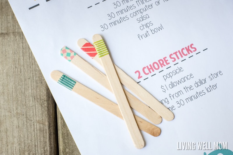 craft sticks with washi tape wrapped around them