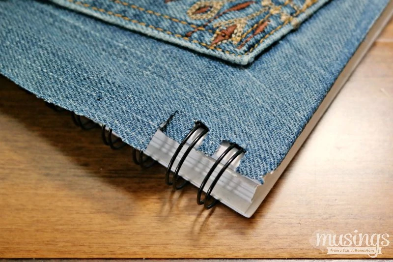 DIY Back to School Denim Notebook - a great way to add some style to a notebook, plus recycle an old pair of jeans that will be enjoyed for a long time to come!