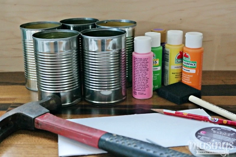 DIY Tin Lanterns are a fun, inexpensive way to recycle and add delightful decoration to your backyard on warm summer nights!