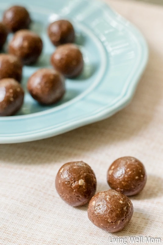 Gluten-free protein balls on a blue plate.