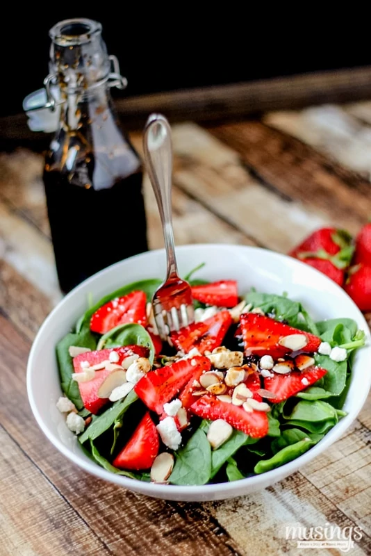 This easy recipe for Strawberry Spinach Salad with Goat Cheese is a delicious way to add more greens to your diet, plus it has protein and is gluten free! 