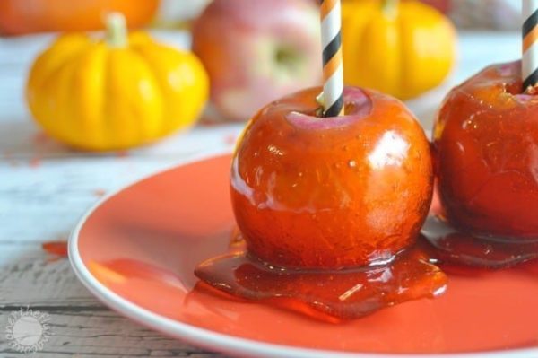 candy apples on an orange plate