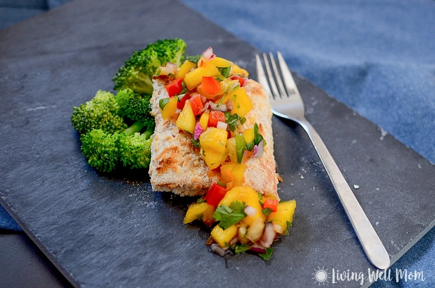 With simple, wholesome ingredients, Coconut Crusted Salmon with Mango Pineapple Salsa is a delicious easy-to-make, Paleo-friendly dinner that tastes like a high-end restaurant meal. 