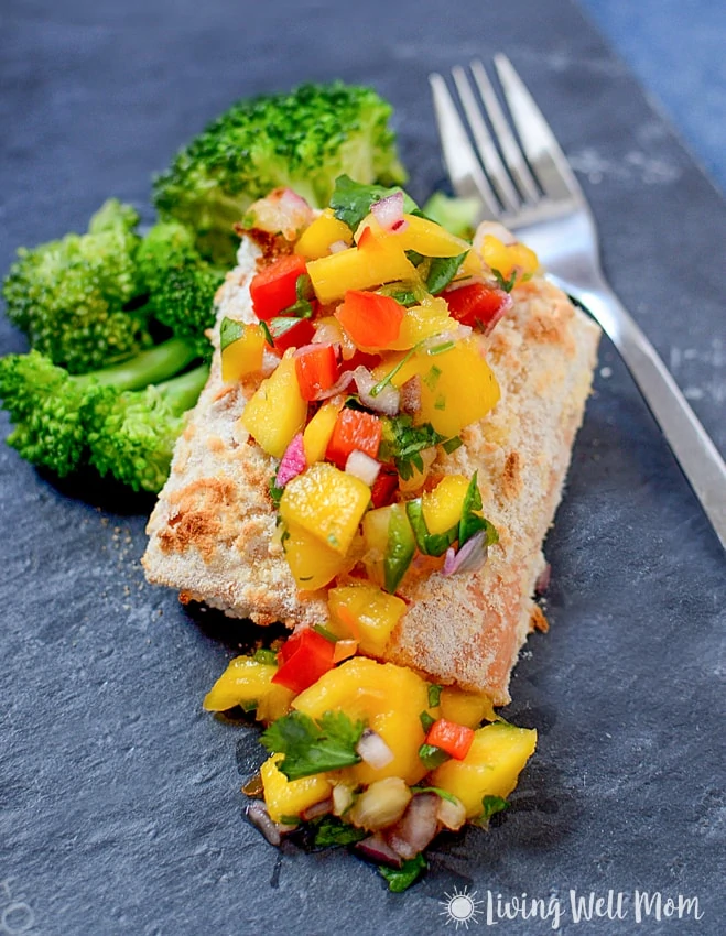 With simple, wholesome ingredients, Coconut Crusted Salmon with Mango Pineapple Salsa is a delicious easy-to-make, Paleo-friendly dinner that tastes like a high-end restaurant meal. 