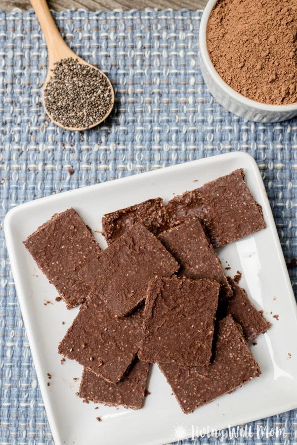 These deliciously crunchy Paleo Chocolate Crunch Energy Bars provide an amazing energy boost! Plus you’ll love that this recipe is guilt free - there’s no refined sugar and the coconut, cacao, and chia seeds all have wonderful benefits!