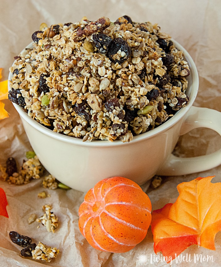 With oats, nuts, dried fruit, maple syrup, pumpkin pie spice, pumpkin, and more, this gluten free Pumpkin Spice Granola is a deliciously filling snack the whole family will love. Plus it takes less than 30 minutes to make!