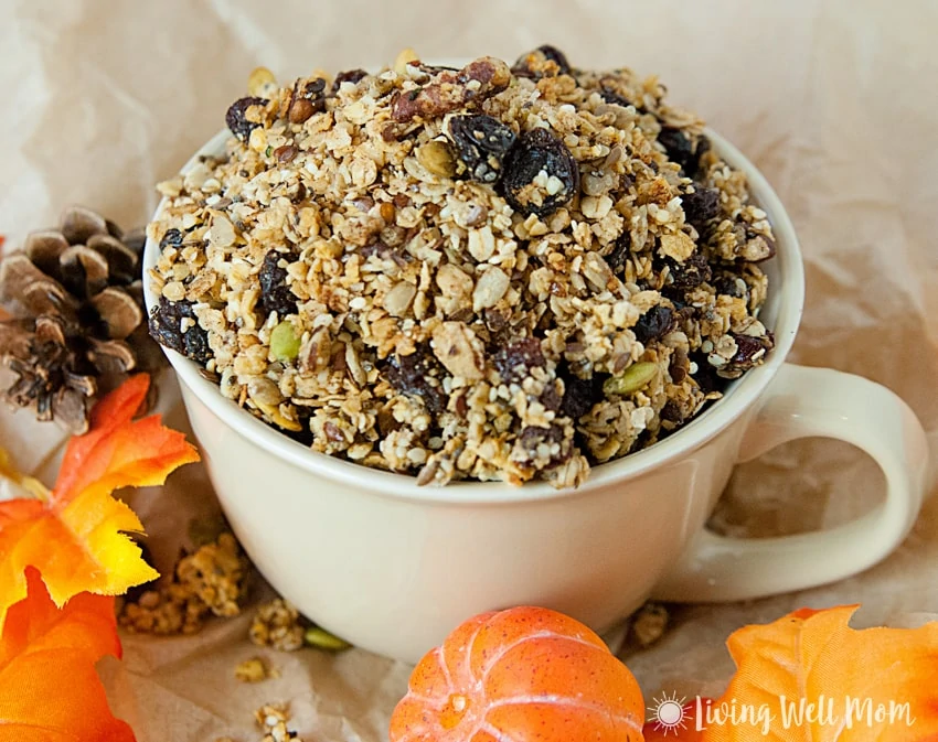 With oats, nuts, dried fruit, maple syrup, pumpkin pie spice, pumpkin, and more, this gluten free Pumpkin Spice Granola is a deliciously filling snack the whole family will love. Plus it takes less than 30 minutes to make!