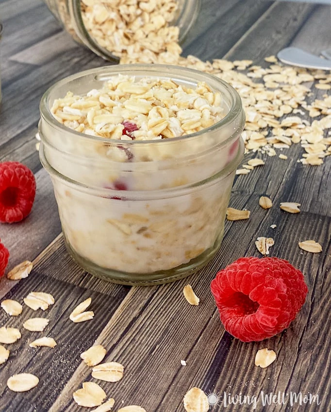 oatmeal with raspberries in a small mason jar