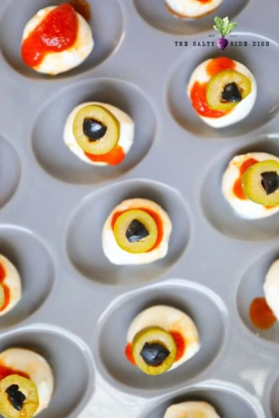 mozarella eyeballs with olives snack