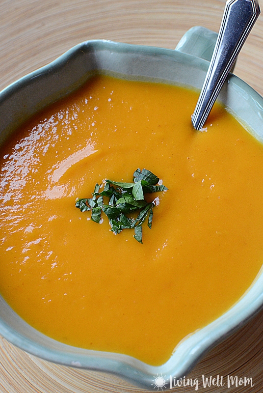 Thai Butternut Squash Soup is comfort food in a bowl without the guilt. You'll never guess this satisfying creamy fall soup is Paleo friendly and oh so easy to make!