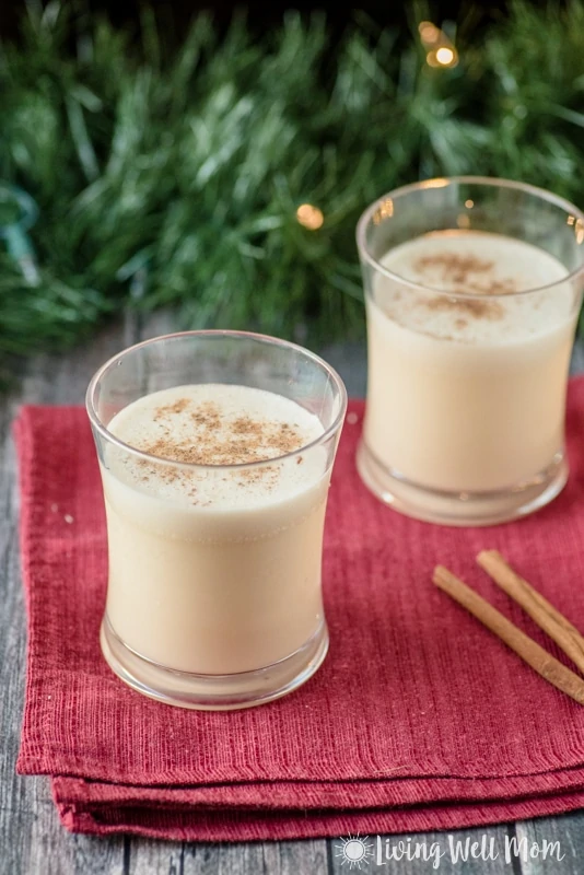 Christmas tree with almond milk eggnog in front