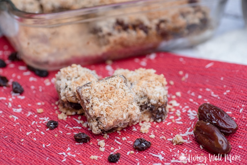 Old Fashioned Raisin Date Bars made Paleo style! This remade family favorite classic recipe is oh-so-good with a chewy date center and coconut flake almond flour crust and topping. You’ll never guess it’s grain free, dairy free, and refined sugar free!