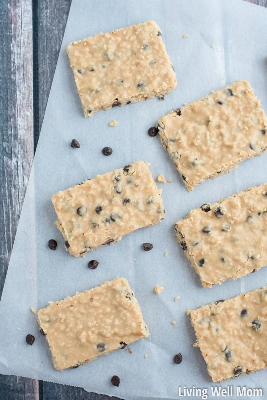 Chocolate Chip Coconut Bars are melt-in-your-mouth tasty and won't last long! It's a good thing it takes just 5 minutes to whip up a batch! With just 6 simple ingredients, this no-bake recipe is Paleo, Gluten-Free, Grain-Free, and Refined-Sugar Free.