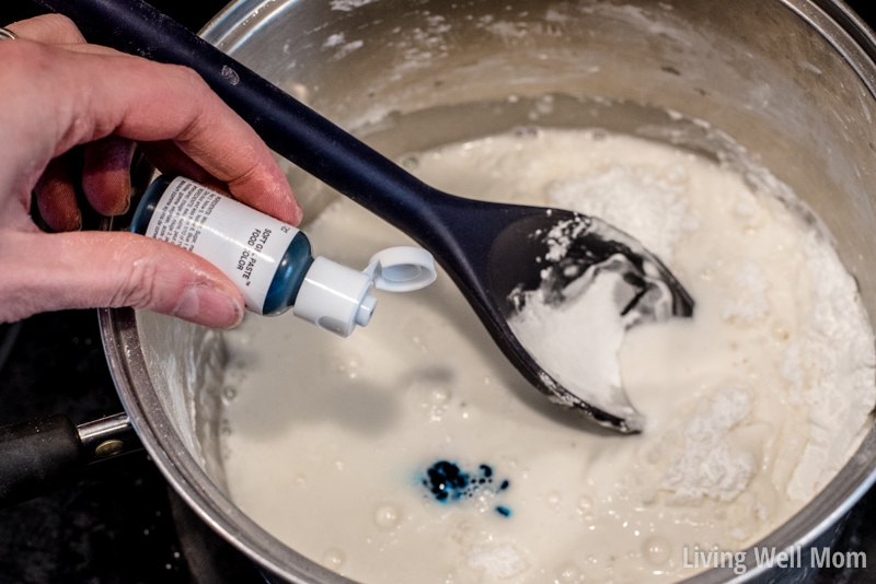 Blue food coloring drops in DIY play dough recipe