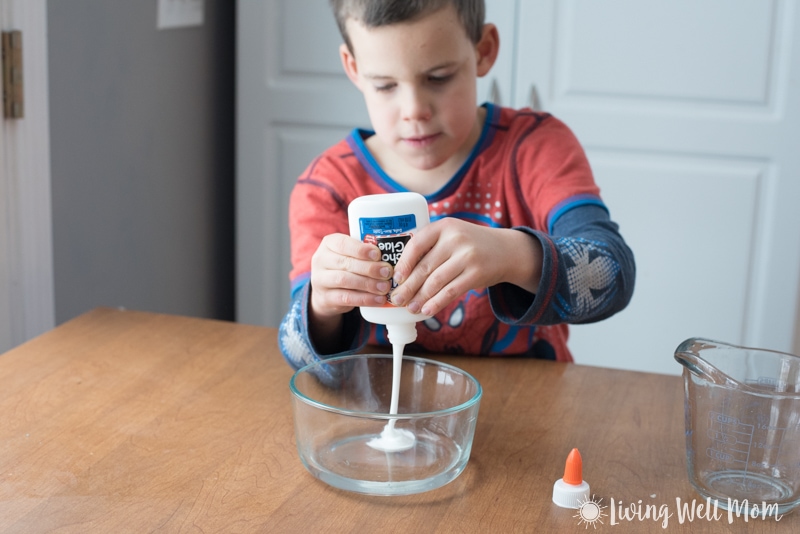 mixing glue and water with a spoon