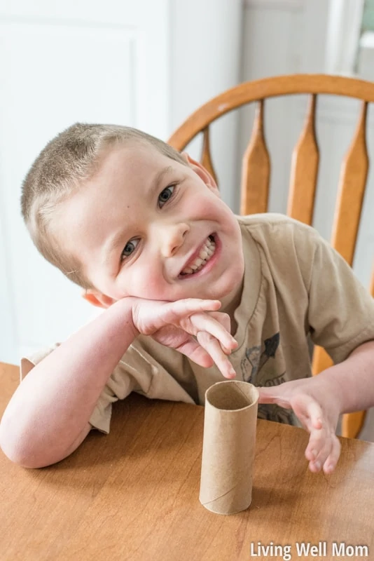 Looking for an easy activity to do with the kids? This simple homemade bird feeder uses common household items you probably already have and is so easy to make, it's the perfect project for young children! Plus it's a great way to teach kids about nature; they'll love seeing wild birds eat from their very own feeder!