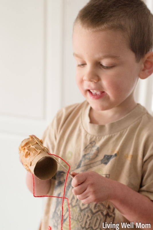 Looking for an easy activity to do with the kids? This simple homemade bird feeder uses common household items you probably already have and is so easy to make, it's the perfect project for young children! Plus it's a great way to teach kids about nature; they'll love seeing wild birds eat from their very own feeder!