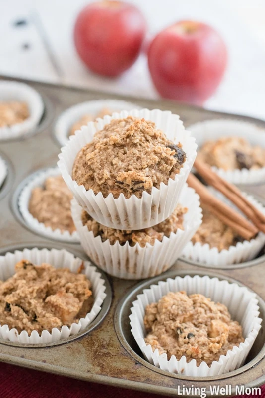 Gluten-Free Apple OatmNeed a satisfying healthy snack for the kids? Soft and delicious, bursting with apple flavor and sweetened only with honey and banana, this Gluten-Free Apple Oatmeal Muffins recipe is kid-approved and easy-to-make!