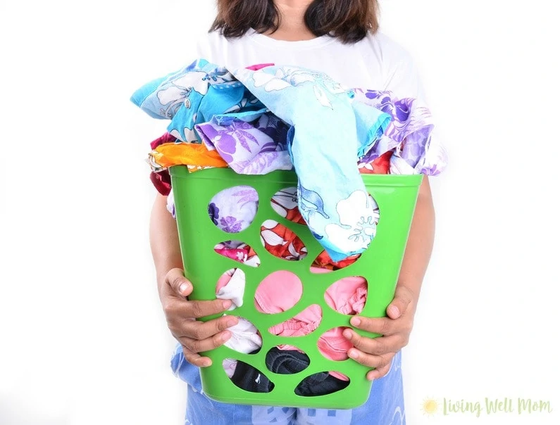 Tired of all that laundry? Moms, you should NOT be doing it all yourself. Find out why it's so important for your kids to help with the laundry.
