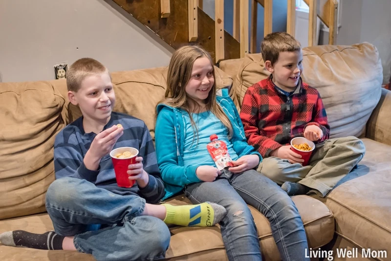 Make your family movie night amazing (no extra work!) with three simple tips. Plus download our free printable "concession stand" tickets that kids will love! You'll save a lot of money compared to going out to the theater and still have a blast!