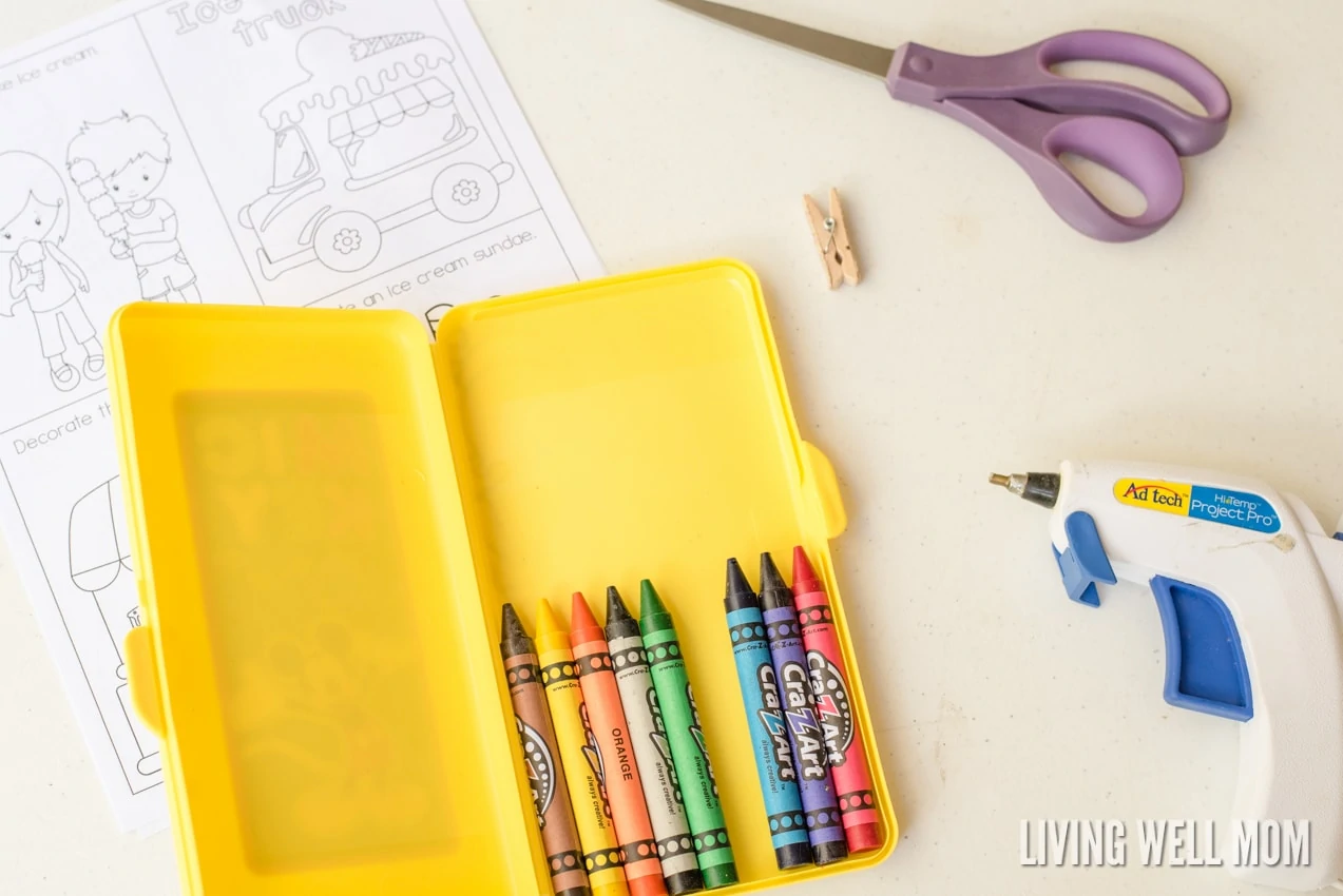 Keep your kids occupied on road trips with this easy-to-make DIY Travel Coloring Kit. It has everything kids need to color, including a clip for coloring pages and an attached crayon box so they're less likely to drop things. Plus free printable coloring pages - the perfect size for this kit!