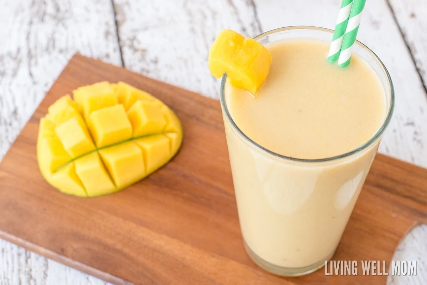 This Coconut Mango Creamsicle Smoothie has a delicious blend of mango and coconut milk, plus a secret healthy ingredient that adds the "creamsicle" factor! Dairy-free, refined sugar-free, Paleo recipe