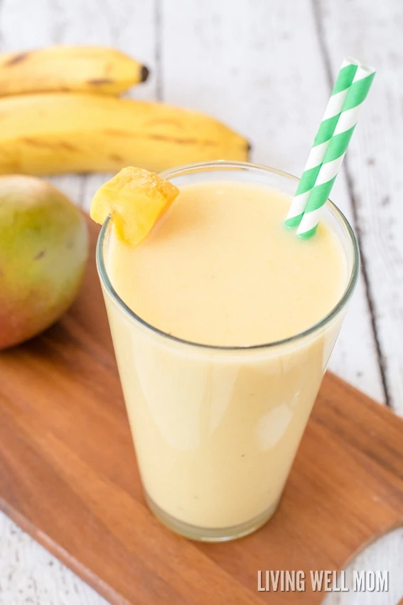 This Coconut Mango Creamsicle Smoothie has a delicious blend of mango and coconut milk, plus a secret healthy ingredient that adds the "creamsicle" factor! Dairy-free, refined sugar-free, Paleo recipe