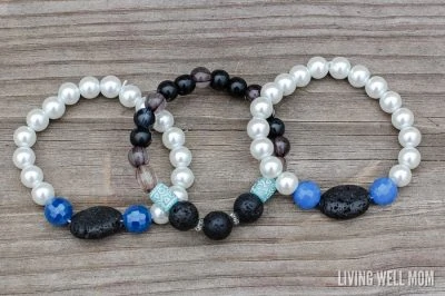 beaded bracelets on wood background