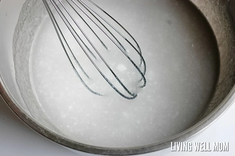 coconut oil, aloe vera gel and peppermint and lavender oil in a mixing bowl