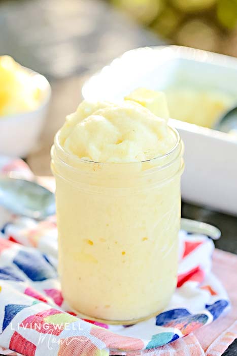 Dairy-free Dole Whip treat on a picnic table.