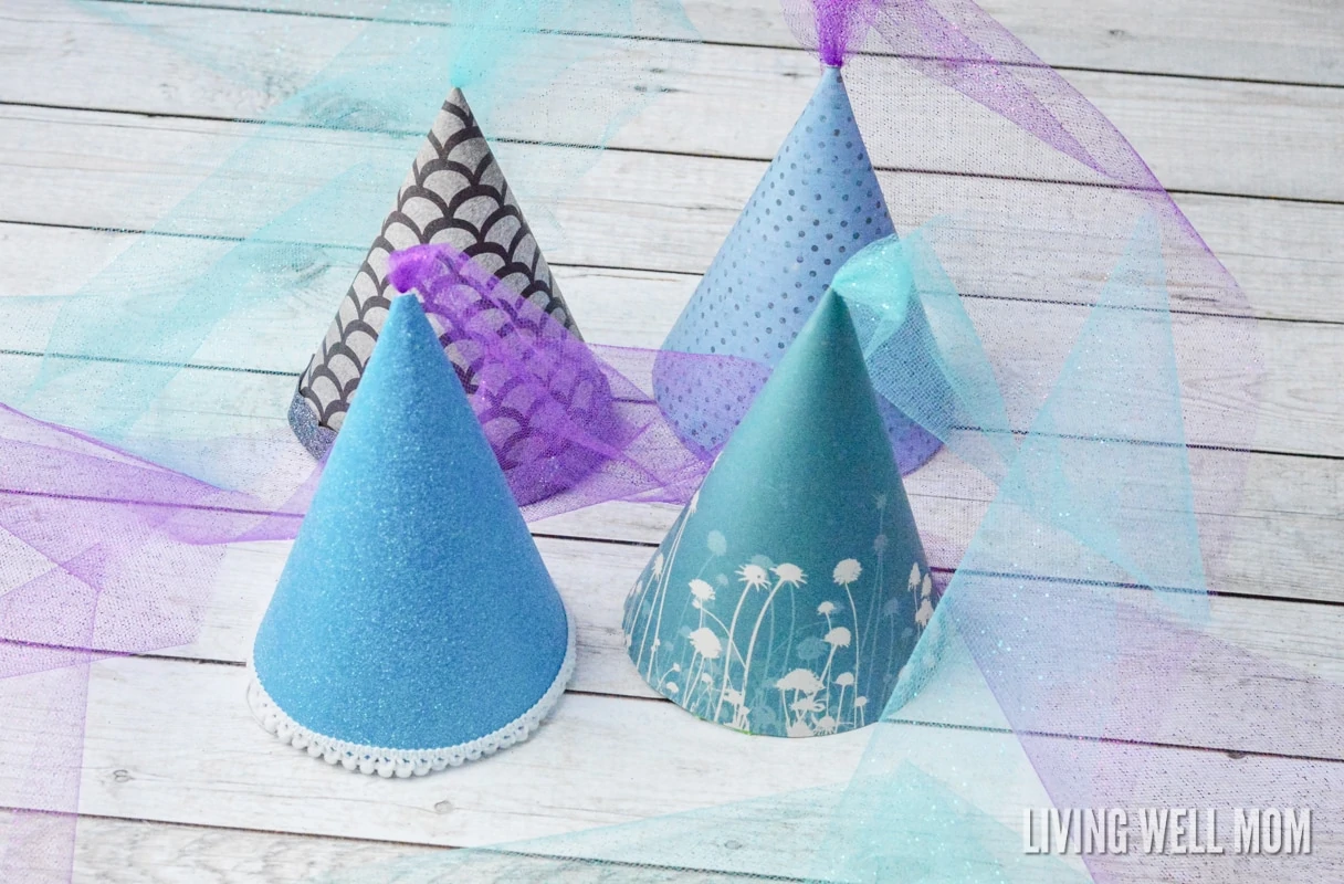 These DIY Princess Hats are easy to make and perfect for any princess! You can use them for dress-up play or as a fun birthday party activity or craft! Plus they’re so easy to make, even us non-crafty moms can do it!