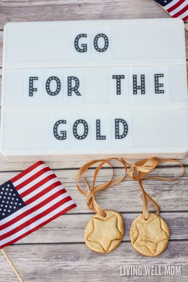 Celebrate the Olympics by making fun DIY Salt Dough Olympic Medals with your kids! They’re a fun craft for children of all ages and they’ll love wearing their very own gold medals as you watch favorite athletes compete! 