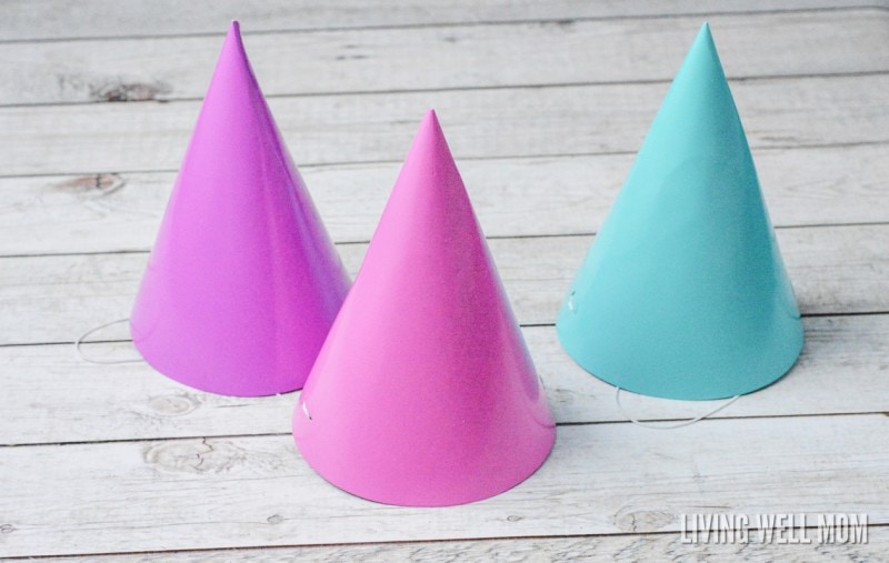 These DIY Princess Hats are easy to make and perfect for any princess! You can use them for dress-up play or as a fun birthday party activity or craft! Plus they’re so easy to make, even us non-crafty moms can do it!