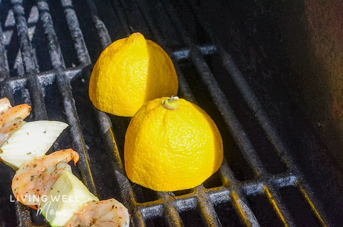 Lemon halves face down on grill