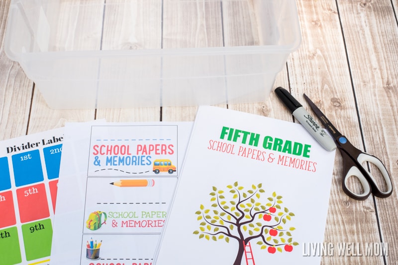 Need a better way to store your kids' school memories? Here's the inexpensive, simple way to organize & store school papers & memories with FREE printables!